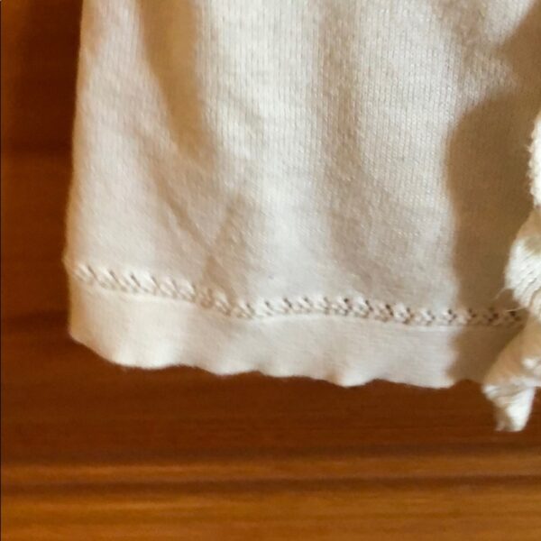 Juicy Couture girl’s short sleeved cream sweater