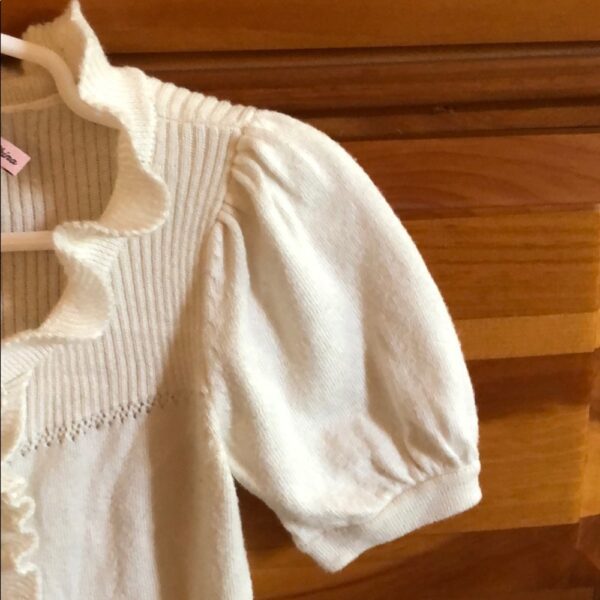 Juicy Couture girl’s short sleeved cream sweater