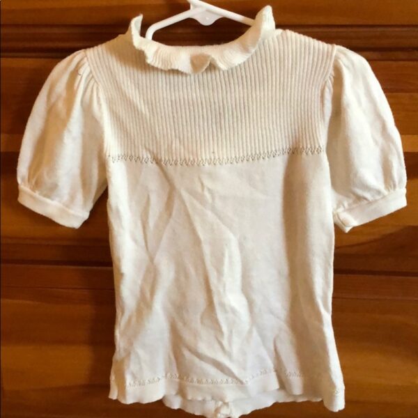 Juicy Couture girl’s short sleeved cream sweater