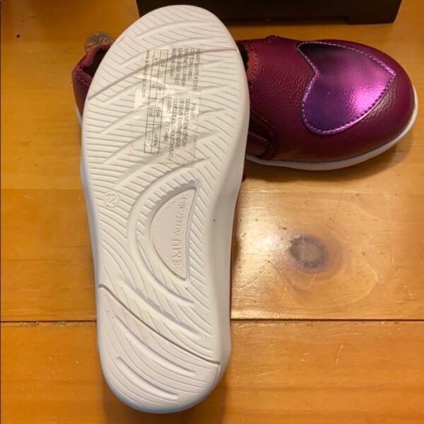 Pr of girl’s slip on cotton-lined Emu shoes