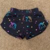 Pr of Terez girl’s shorts with unicorns, size sm