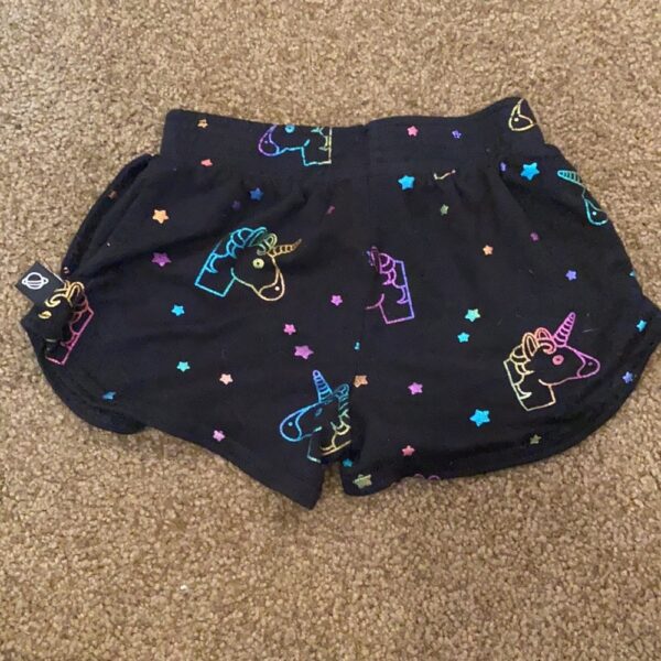 Pr of Terez girl’s shorts with unicorns, size sm