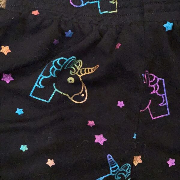 Pr of Terez girl’s shorts with unicorns, size sm
