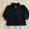 Boy’s Obermeyer black fleece pullover, size xs (2-4)