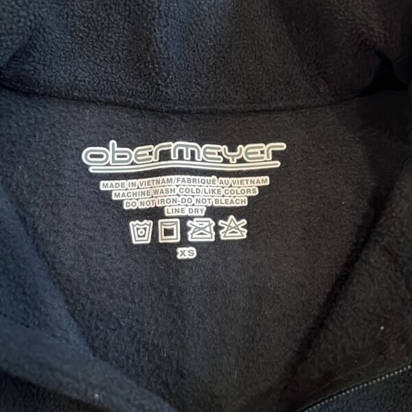 Boy’s Obermeyer black fleece pullover, size xs (2-4)