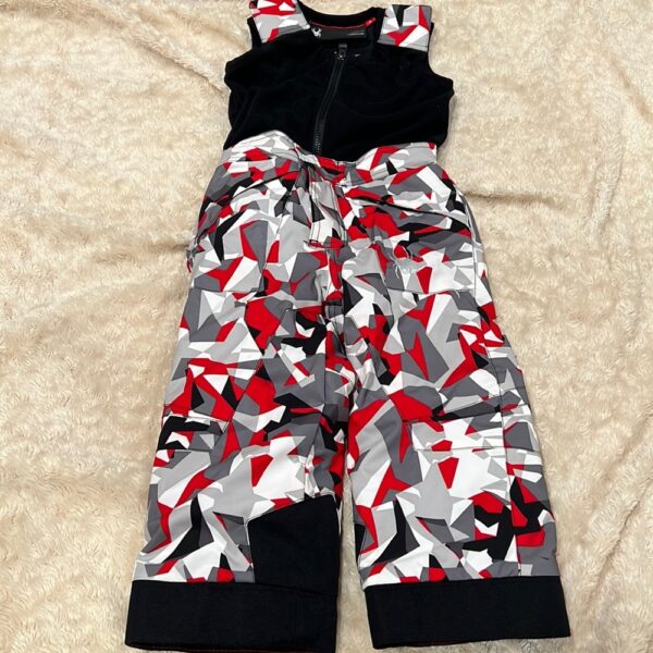 Pr of Spyder snowbibs, red, white, and black, sz 3