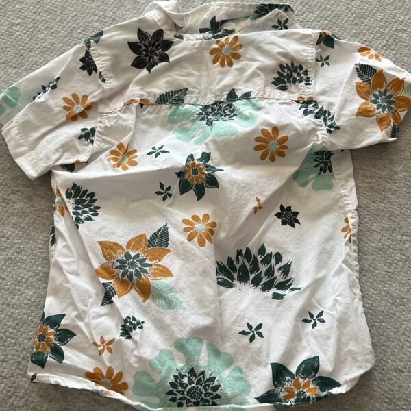 Boy’s short sleeved button up Aloha shirt by Quiksilver, size 6