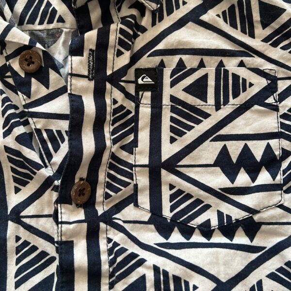 Boy’s short sleeved, button up Aloha shirt by Quiksilver, size 5