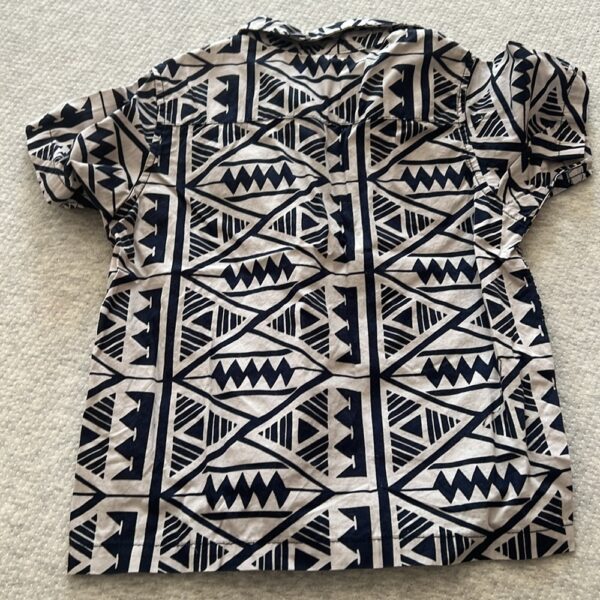 Boy’s short sleeved, button up Aloha shirt by Quiksilver, size 5