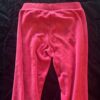 Pair of girl’s pink velour sweatpants by Juicy Couture, size 4/5