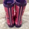 Pair of girl’s pink unicorn rain boots by Hatley, sz 12