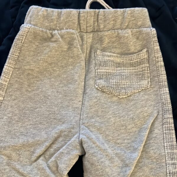 NWOT, pair of light grey boy’s medium weight sweatpants, Miki Miette, size 6