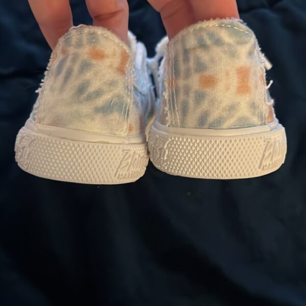 NWOT, pair of girl’s slip on casual sneakers by Blowfish, size 13
