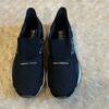 New Balance, like new, pair of black slip on sneakers, size 3