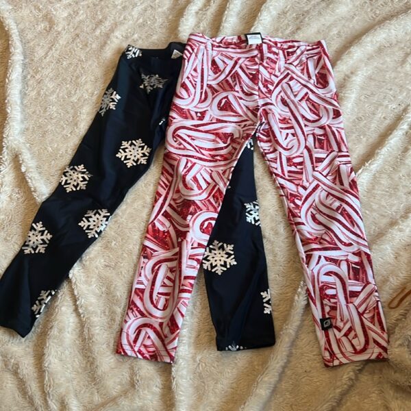 Terez, pair of girl’s holiday leggings, little girl’s size 5-6